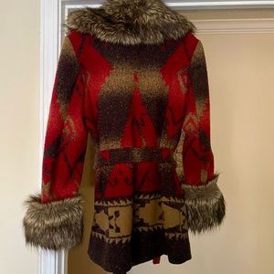 Tasha Polizzi beautiful women’s jacket with fur trim.